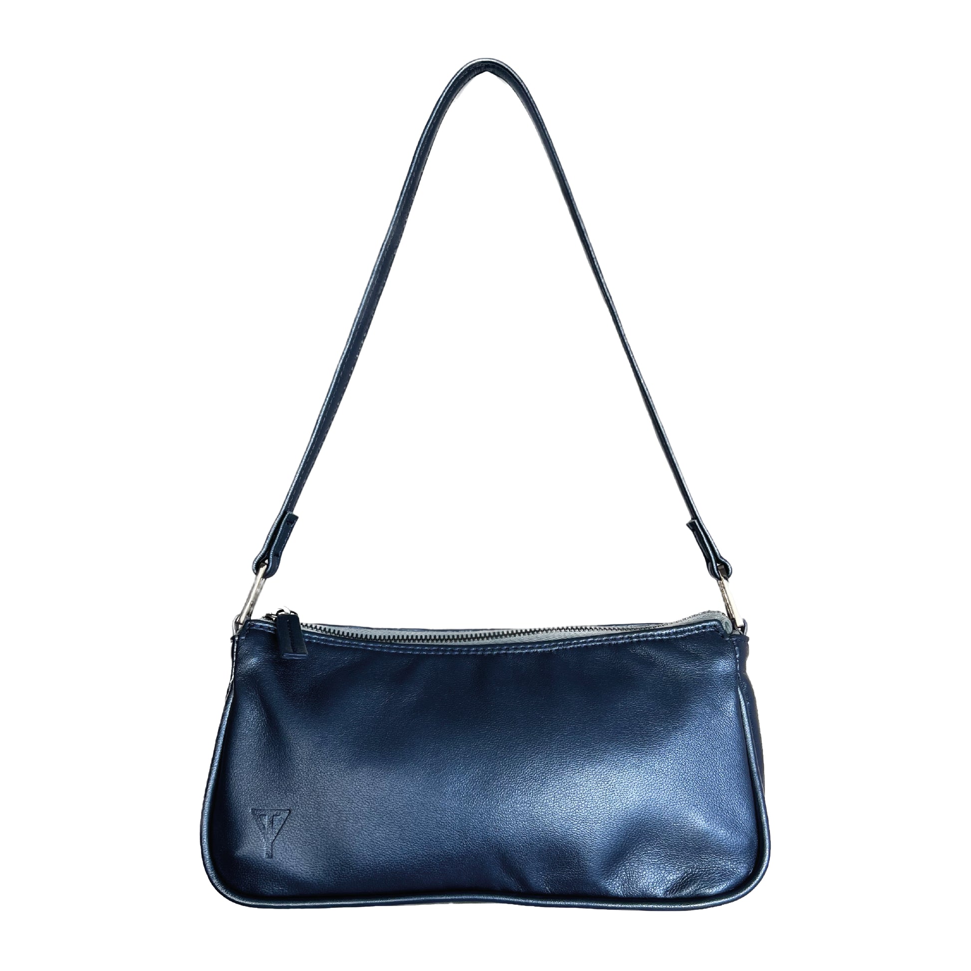 Taylor Yates Jenny Shoulder Bag in Ocean – A sustainably crafted handbag made from soft, high-quality leather with a relaxed, slouchy design. The spacious interior makes it perfect for carrying everyday essentials with ease. The leather has a smooth, supple texture, and the deep ocean blue color adds a refined yet versatile touch. With its minimalist aesthetic and comfortable shoulder strap, this bag is both stylish and practical. Ethically made, it reflects Taylor Yates’ commitment to sustainability and ti